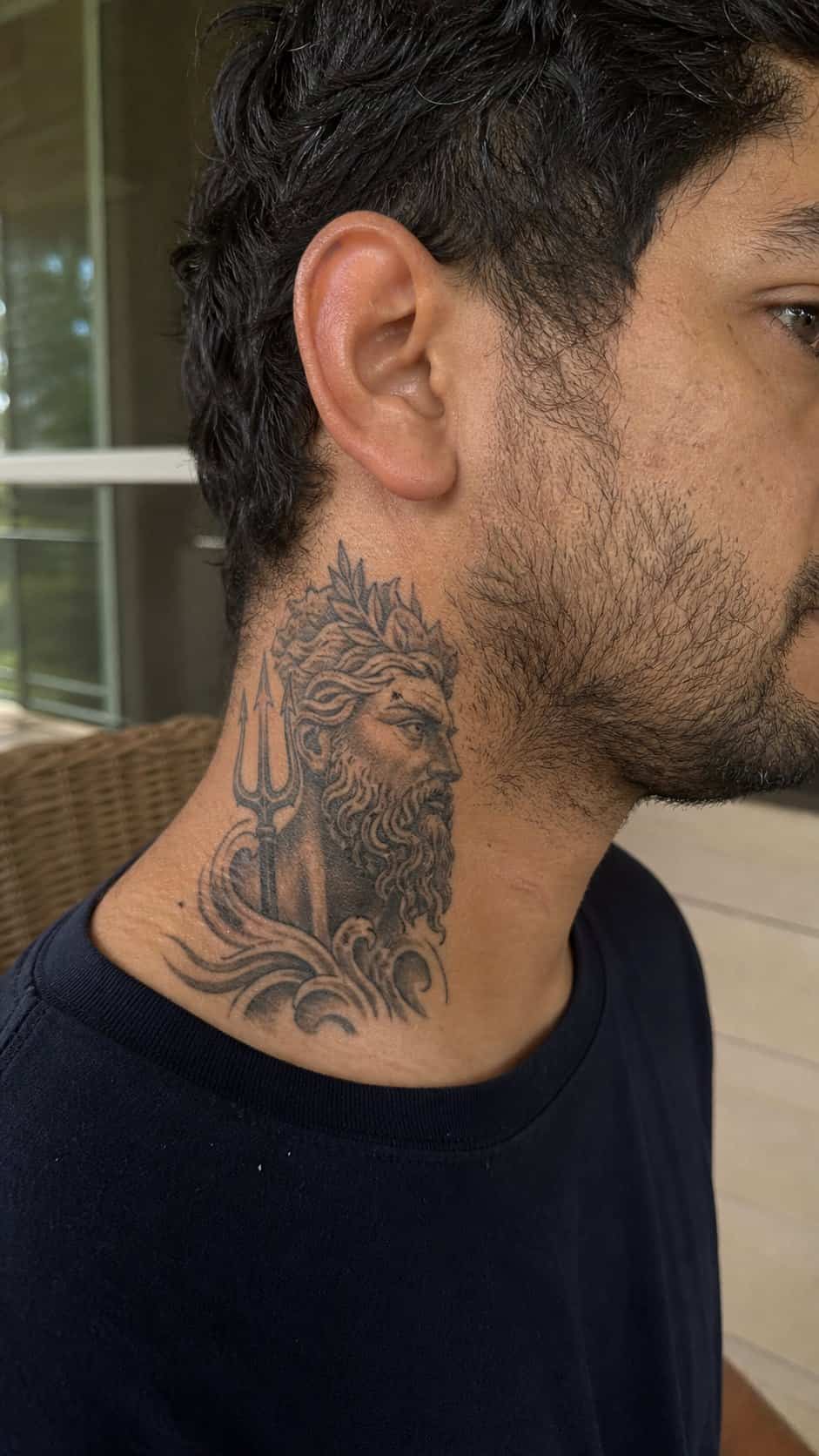 15 Neck Tattoo Ideas for Men Worth Considering 26 Healed ancient mythology tattoo on a adult man's side neck, photographed in a natural straight-on close view, a touch off-center like — study 2