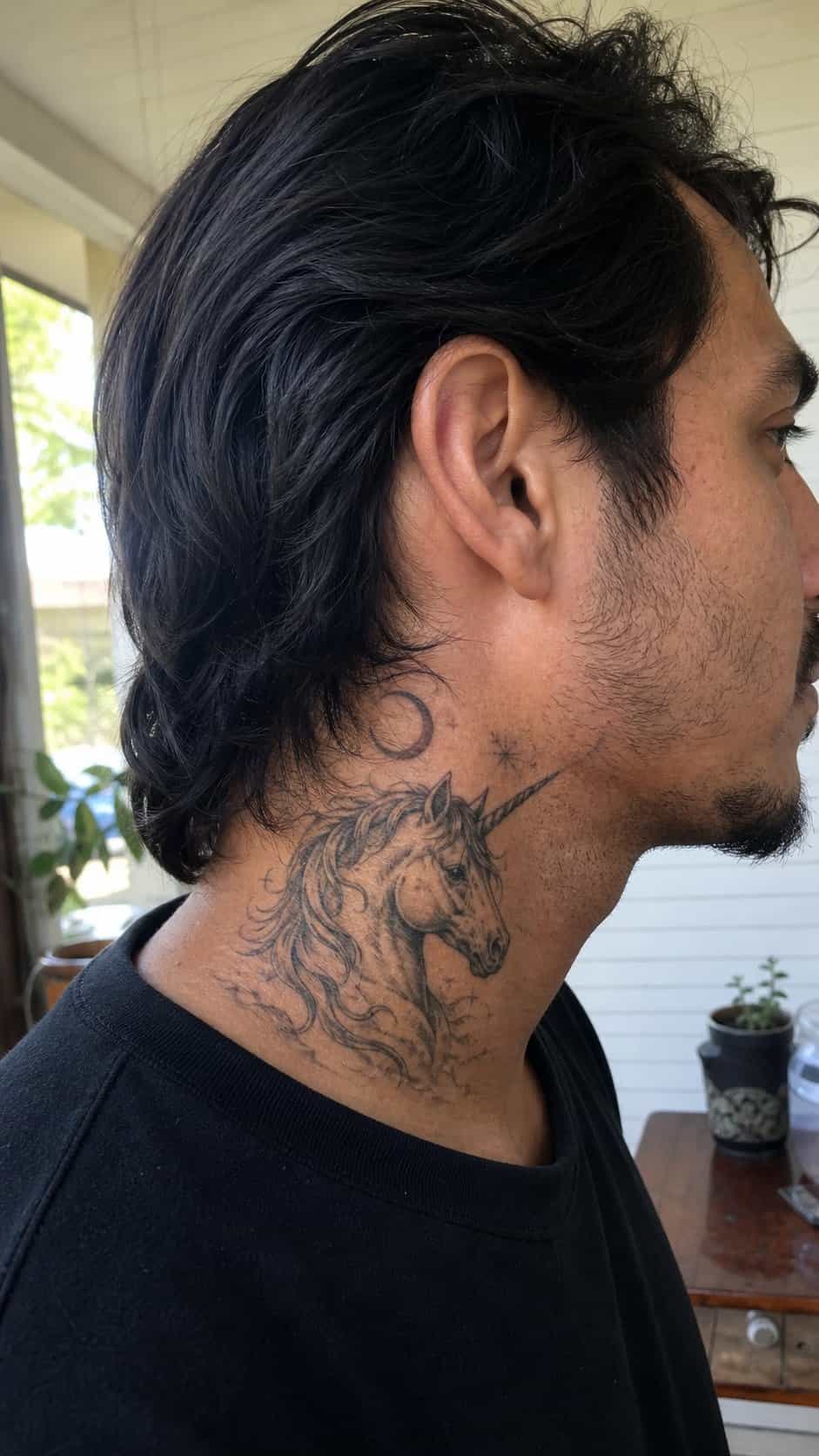 15 Neck Tattoo Ideas for Men Worth Considering 31 Healed fantasy elements tattoo on a adult man's side neck, photographed in a natural waist-height candid close-up — study 1