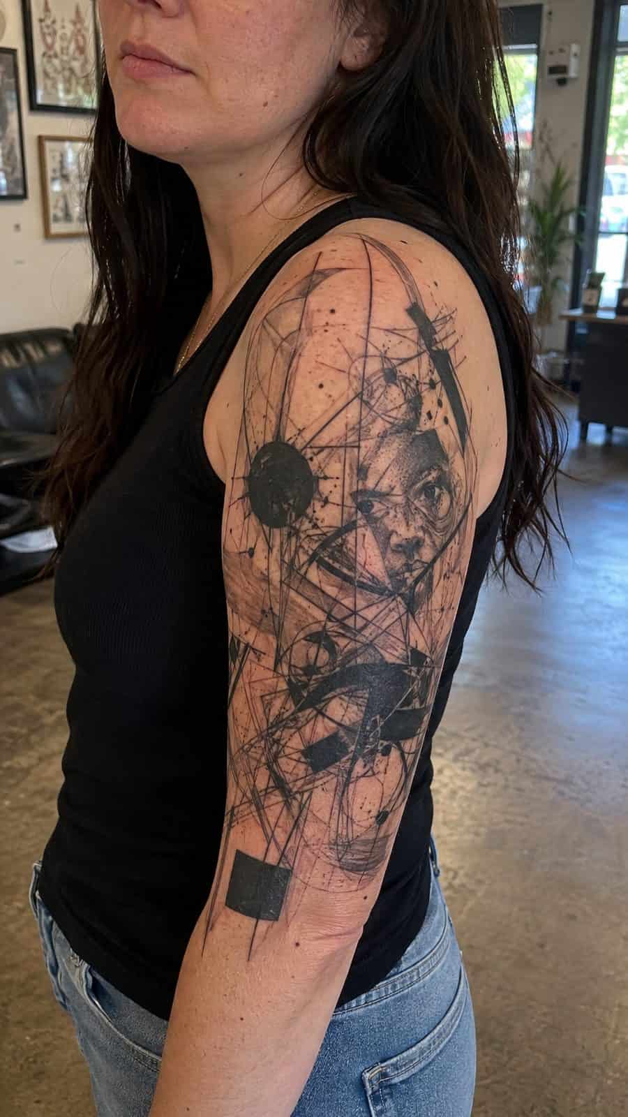 20 Edgy Grunge Tattoo Ideas for Women Who Break the Rules 6 Healed abstract chaos sleeve tattoo on a adult woman's upper-arm sleeve, photographed in a natural gentle side angle that clearly — study 3