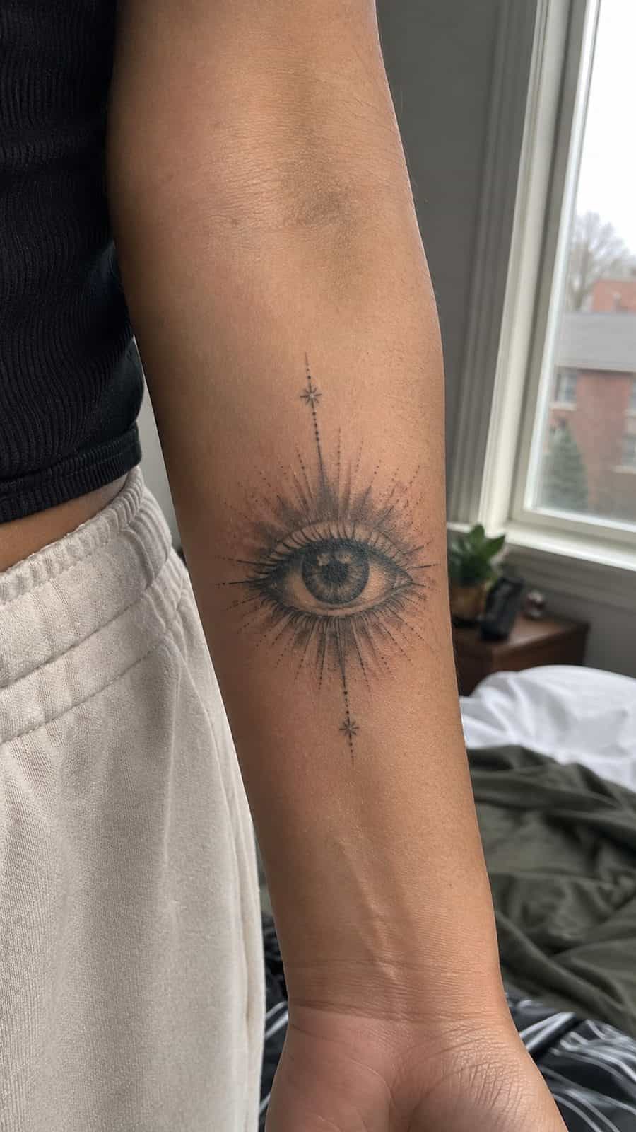20 Edgy Grunge Tattoo Ideas for Women Who Break the Rules 17 Healed mysterious eye tattoo on a adult woman's inner forearm, photographed in a natural relaxed documentary crop — study 2
