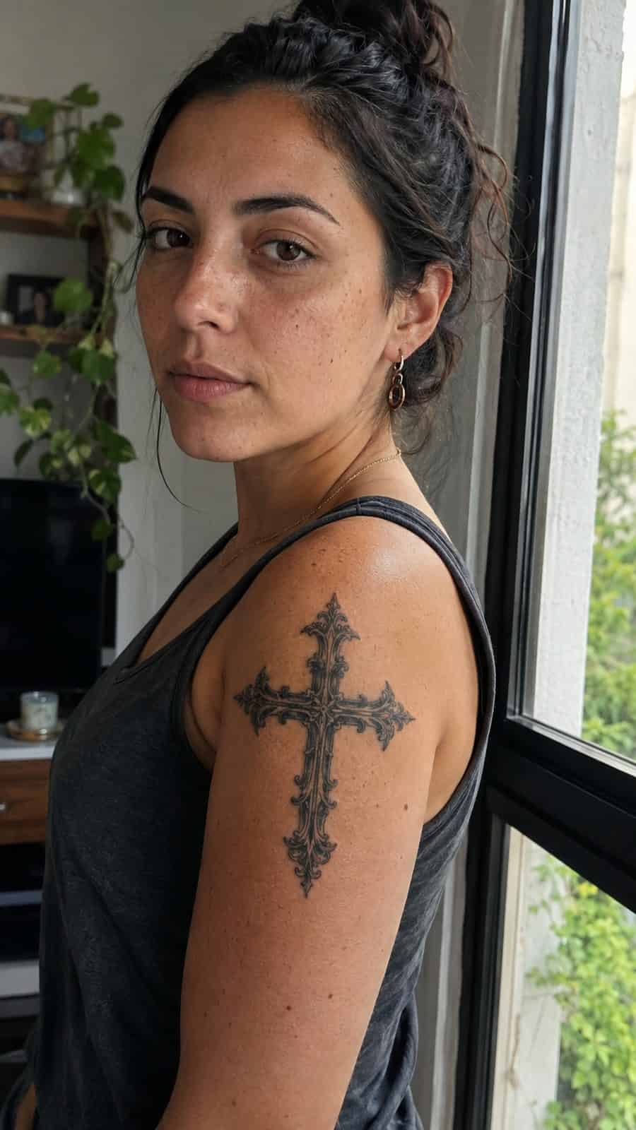 20 Edgy Grunge Tattoo Ideas for Women Who Break the Rules 24 Healed gothic cross tattoo on a adult woman's shoulder, photographed in a natural gentle side angle that clearly shows how the ink — study 2