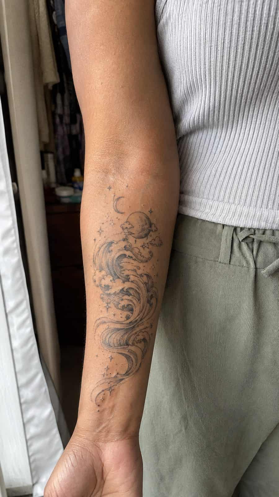 20 Edgy Grunge Tattoo Ideas for Women Who Break the Rules 30 Healed sea of dreams tattoo on a adult woman's inner forearm, photographed in a natural slightly elevated close view — study 1