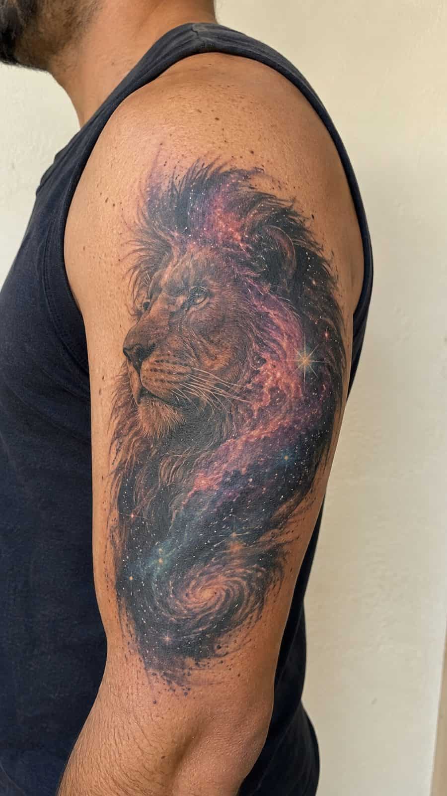 Unleash Your Inner Strength: 20 Male Lion Tattoo Ideas You Need to See 23 Healed galaxy lion tattoo on a adult man's outer upper arm, photographed in a natural gentle side angle that clearly shows how the ink — study 1