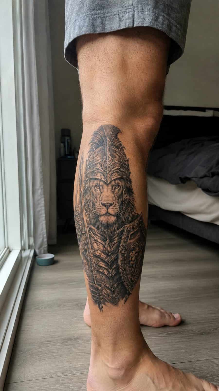 Unleash Your Inner Strength: 20 Male Lion Tattoo Ideas You Need to See 30 Healed warrior spirit tattoo on a adult man's outer calf, photographed in a natural gentle side angle that clearly shows how the ink — study 2
