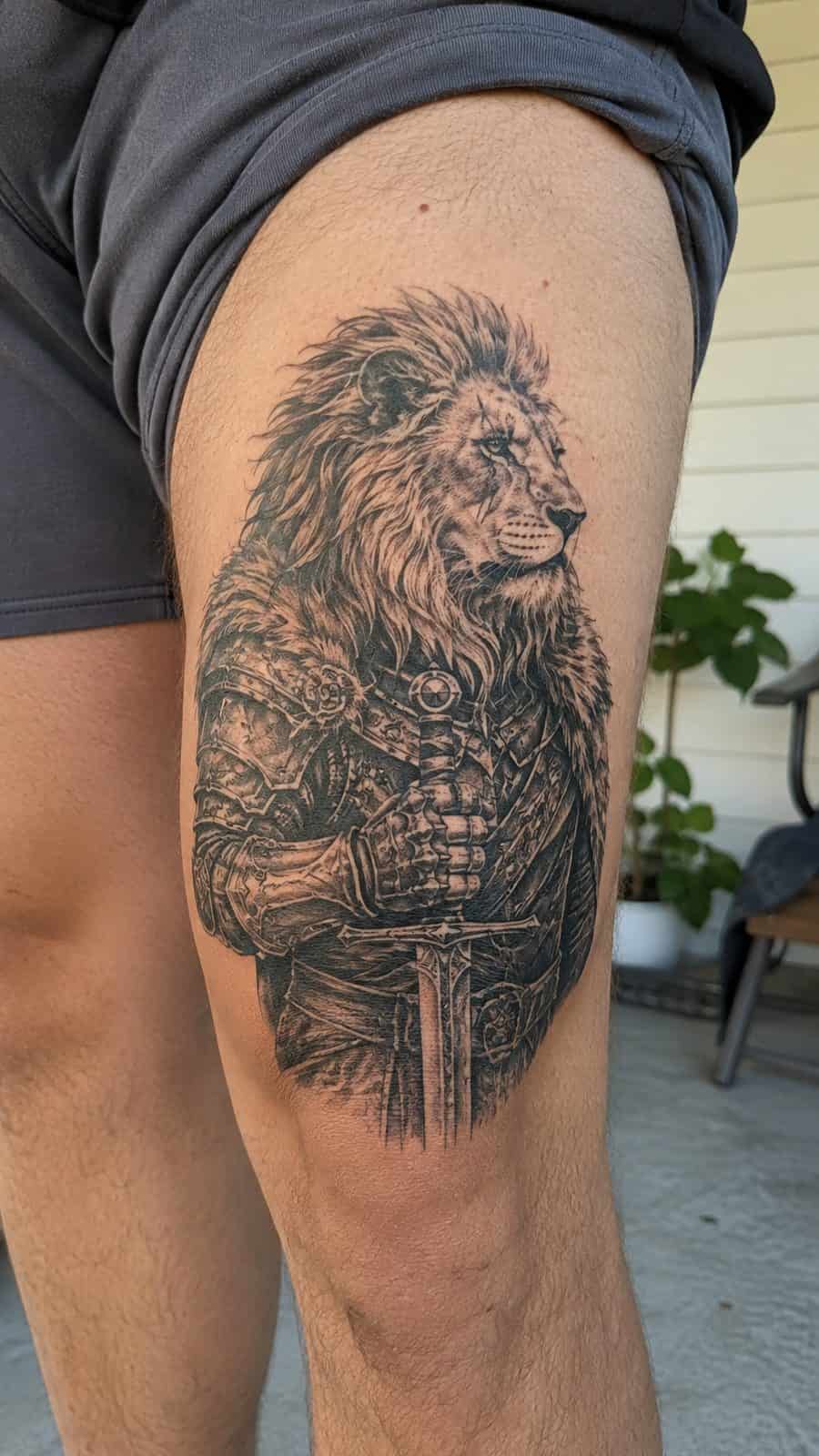 Unleash Your Inner Strength: 20 Male Lion Tattoo Ideas You Need to See 31 Healed warrior spirit tattoo on a adult man's outer thigh, photographed in a natural slightly elevated close view — study 3