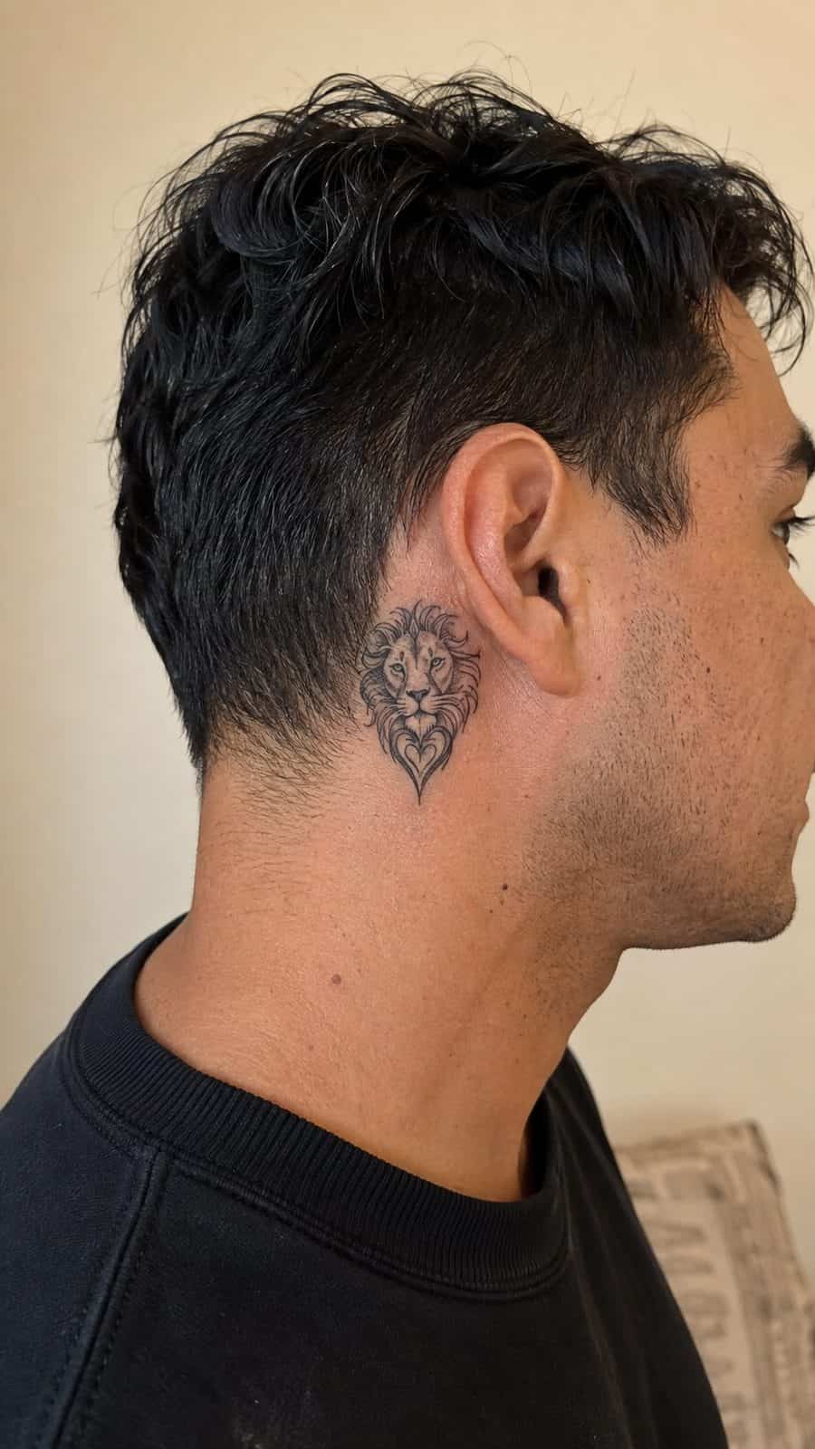 Unleash Your Inner Strength: 20 Male Lion Tattoo Ideas You Need to See 33 Healed lion's heart tattoo on a adult man's behind the ear, photographed in a natural slightly elevated close view — study 2