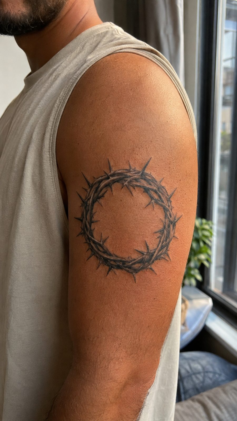 Unleash Your Inner Strength: 20 Male Lion Tattoo Ideas You Need to See 35 Healed crown of thorns tattoo on a adult man's outer upper arm, photographed in a natural relaxed documentary crop — study 2