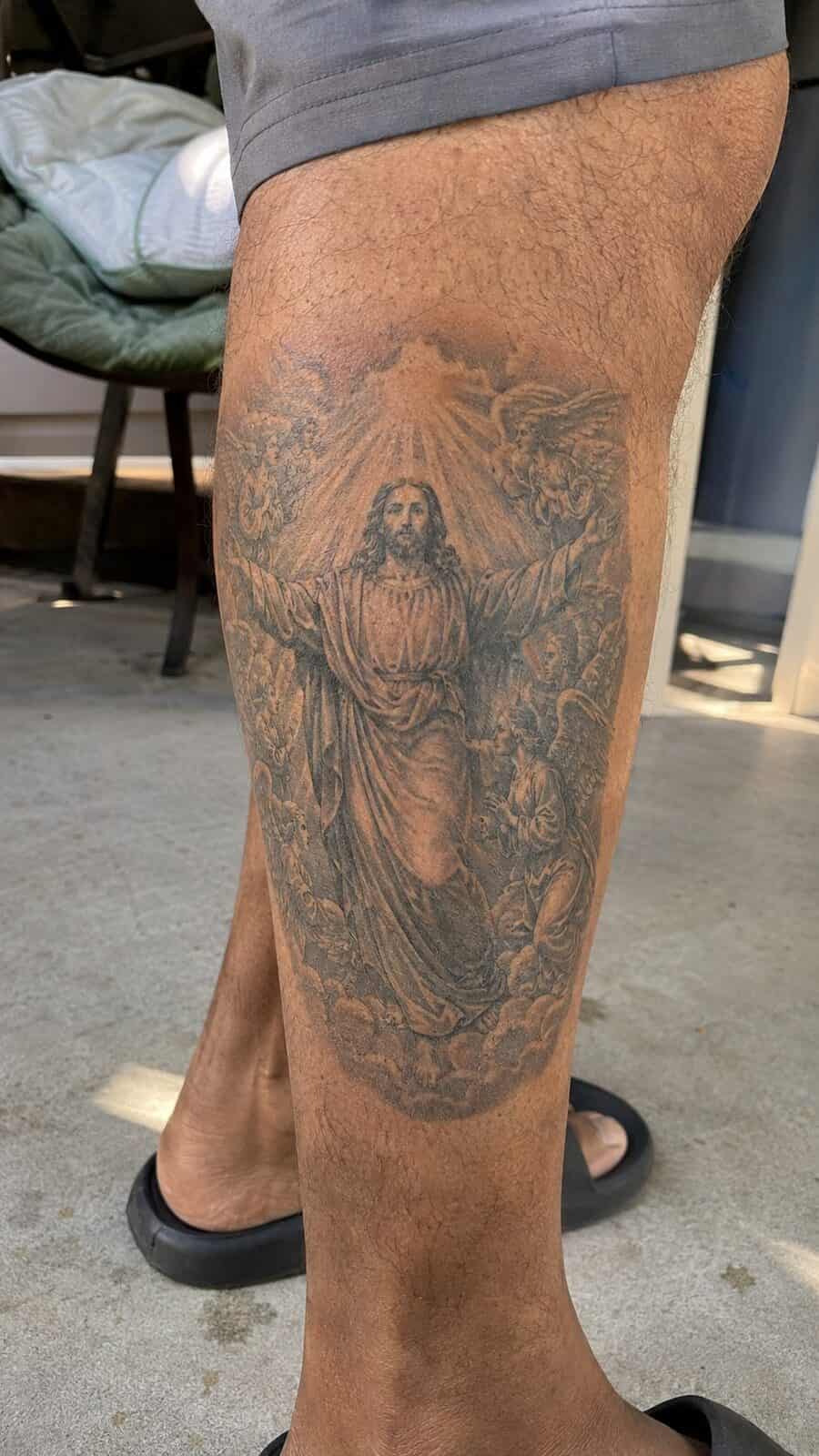 Exploring 18 Profound Jesus Tattoo Ideas for the Modern Man 16 Healed jesus with angels tattoo on a adult man's outer calf, photographed in a natural straight-on close view, a touch off-center like — study 1