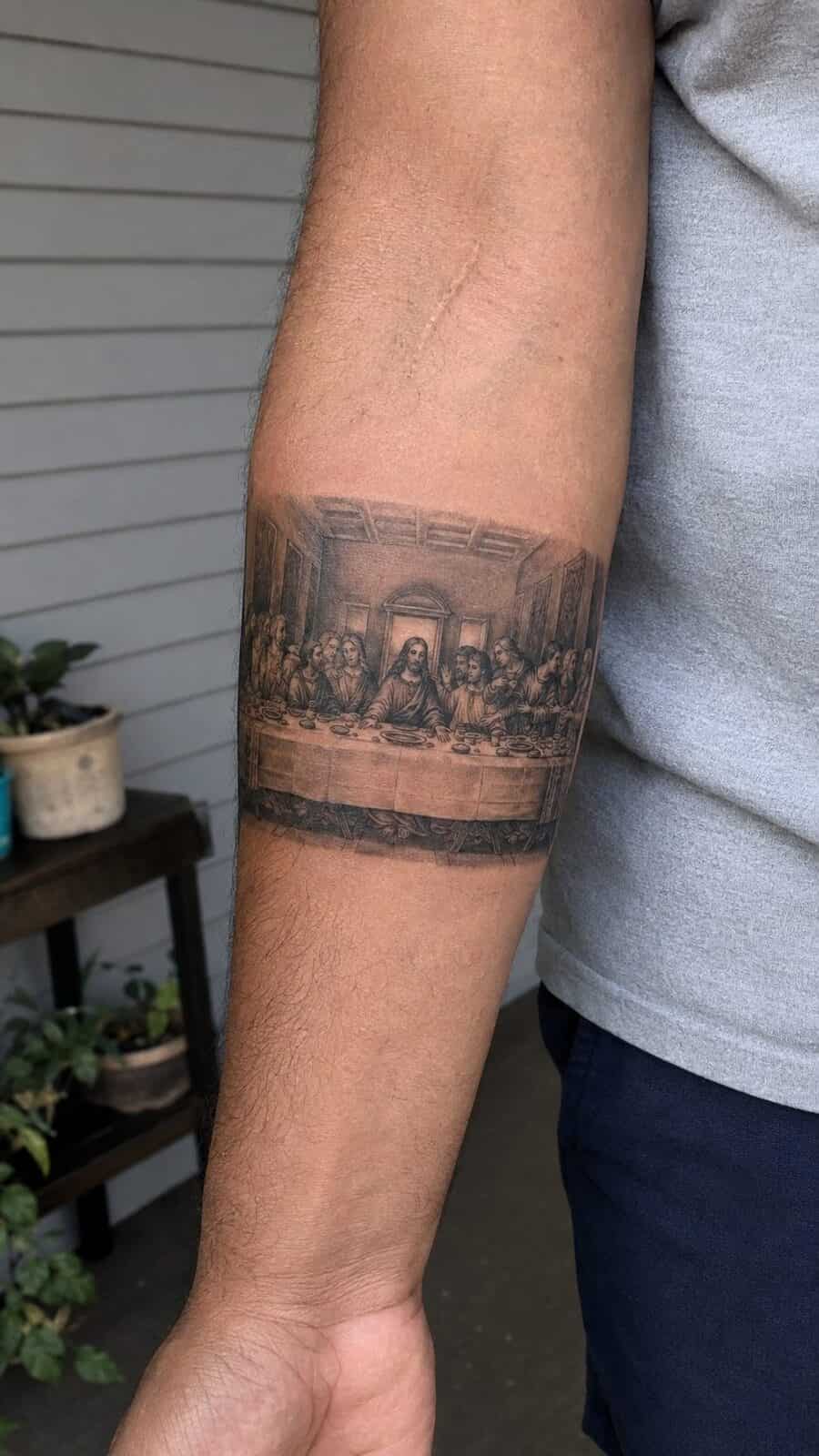 Exploring 18 Profound Jesus Tattoo Ideas for the Modern Man 19 Healed jesus and the last supper tattoo on a adult man's inner forearm, photographed in a natural straight-on close view, a touch — study 2