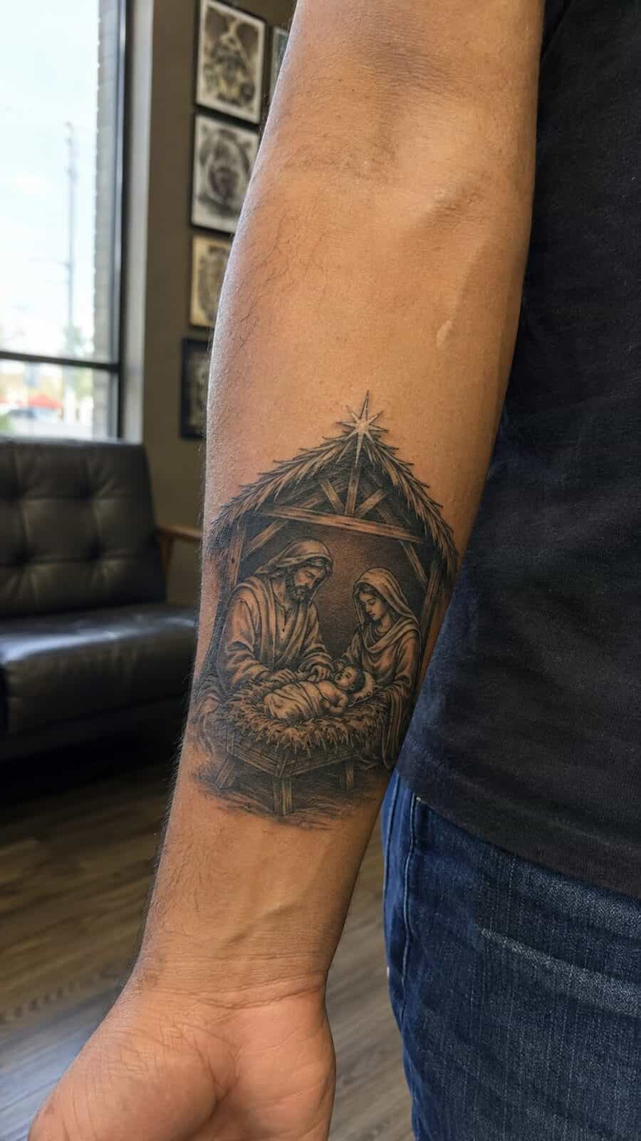 Exploring 18 Profound Jesus Tattoo Ideas for the Modern Man 24 Healed jesus in the manger tattoo on a adult man's inner forearm, photographed in a natural relaxed documentary crop — study 1