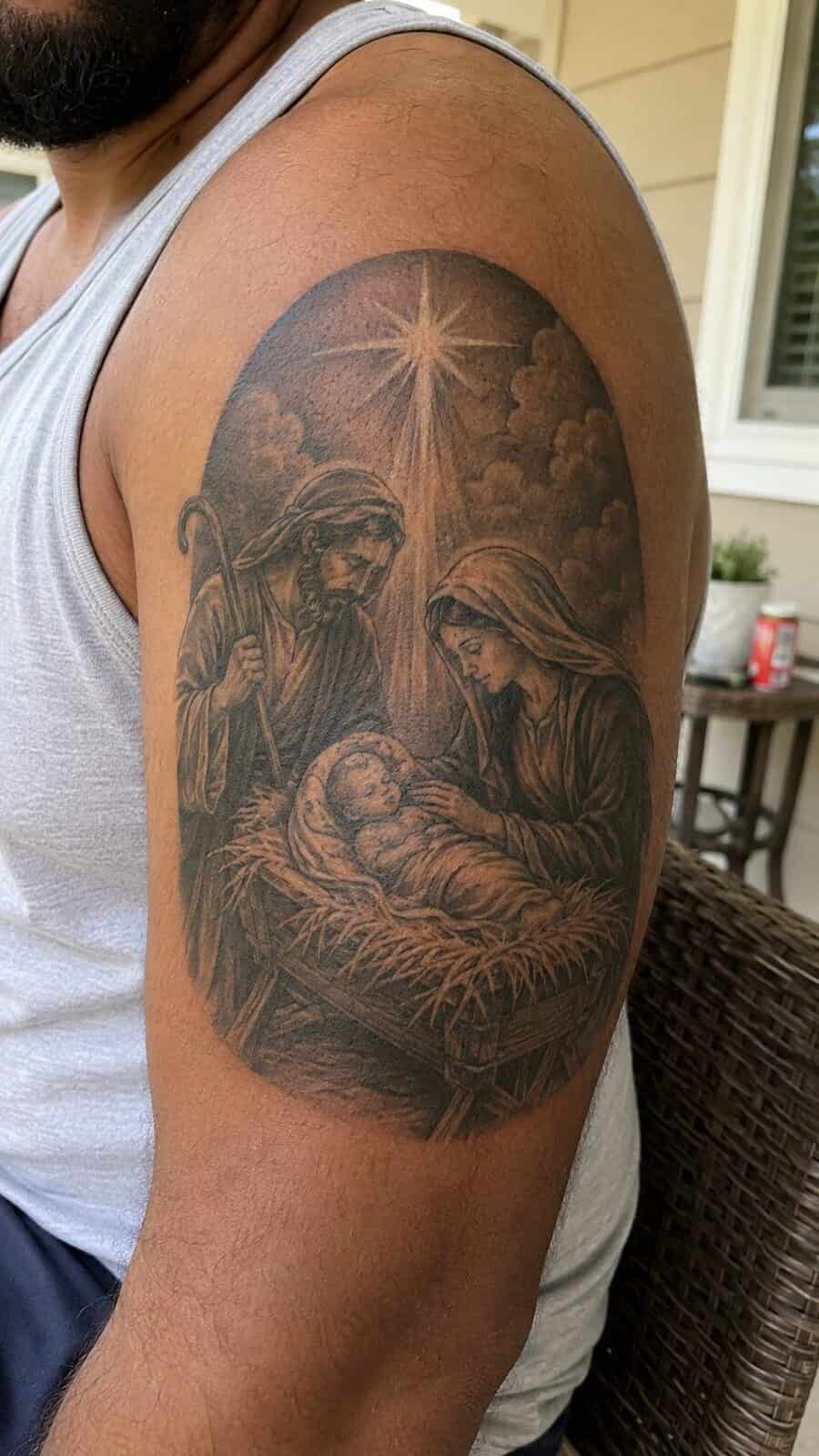 Exploring 18 Profound Jesus Tattoo Ideas for the Modern Man 26 Healed jesus in the manger tattoo on a adult man's outer upper arm, photographed in a natural straight-on close view, a touch — study 3