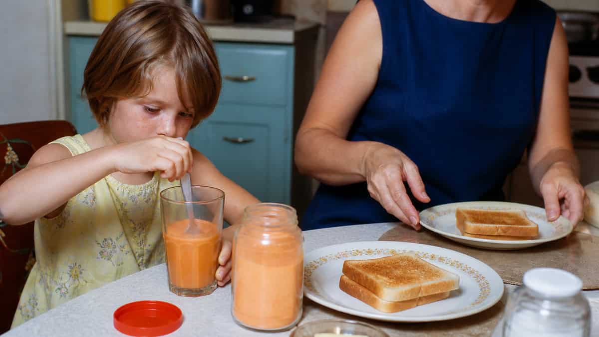 15 TV Commercials from Our Childhood That Would Be Banned Today 8 Child mixing an orange breakfast drink in the late 1960s