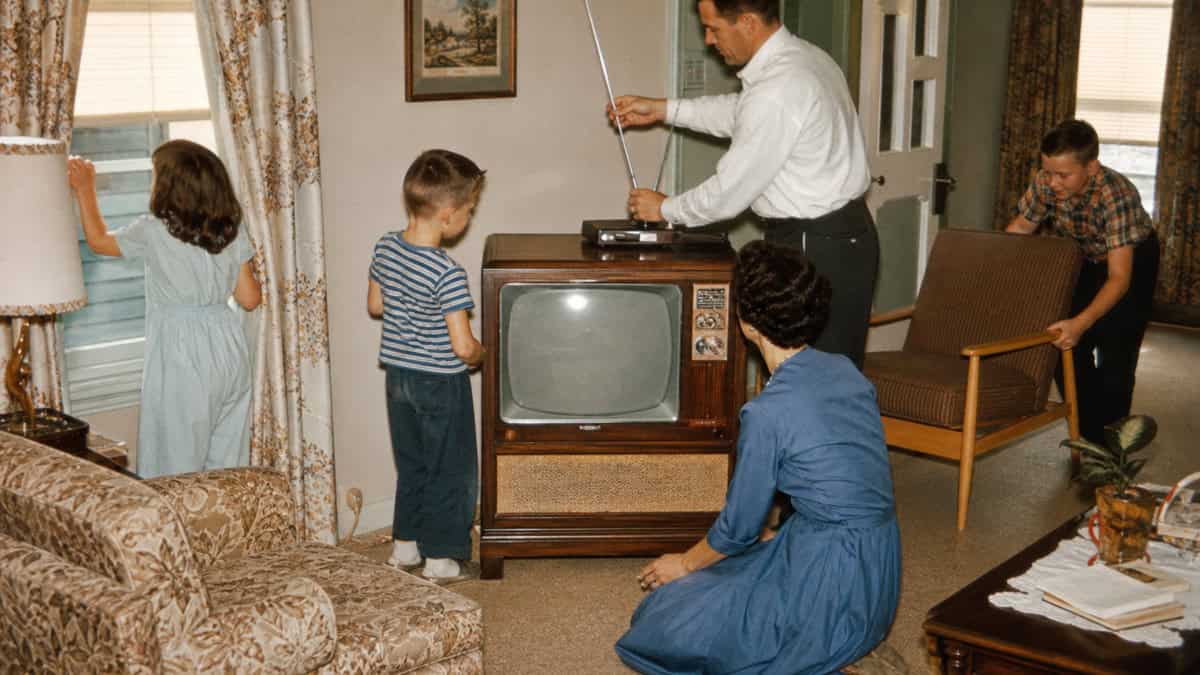 15 TV Commercials from Our Childhood That Would Be Banned Today 10 Family setting up a new television together in the early 1960s
