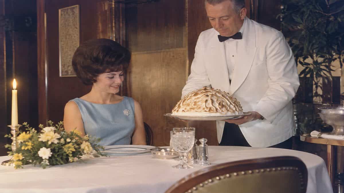16 Once-Popular '60s Foods That Are Hard to Find Today 13 Baked Alaska being served