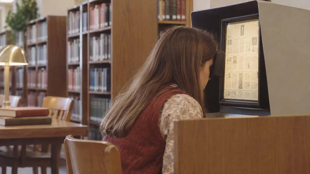 14 Things Teachers Swore We'd Need That We Haven't Used Since 1975 14 Student using a real microfiche reader in a 1970s library