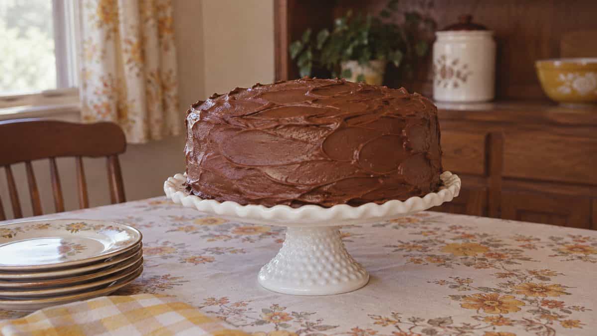 18 Church Potluck Recipes That Nobody Makes Anymore 19 Homemade chocolate cake on a vintage stand