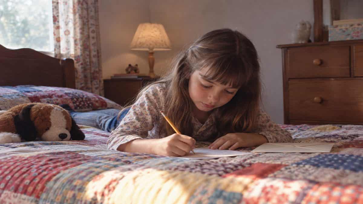 Before Screens: How We Entertained Ourselves 11 Child writing a note