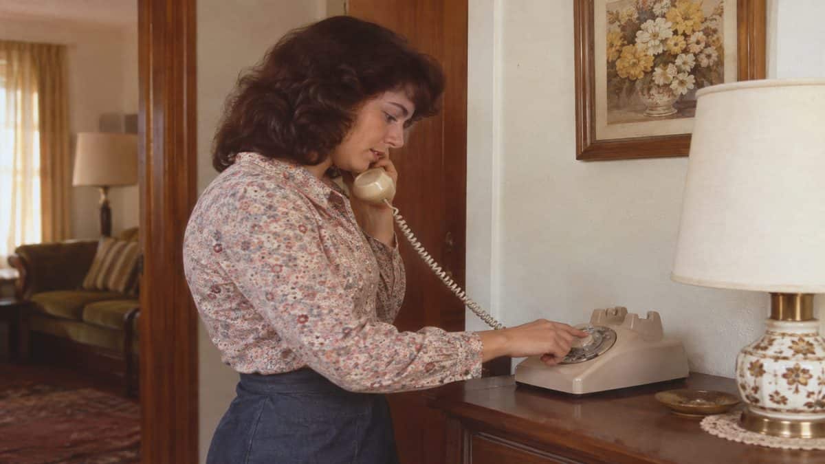 17 Life Skills We Learned Without the Internet That Made Us Smarter 9 Genuine retro photo of a person dialing a rotary phone
