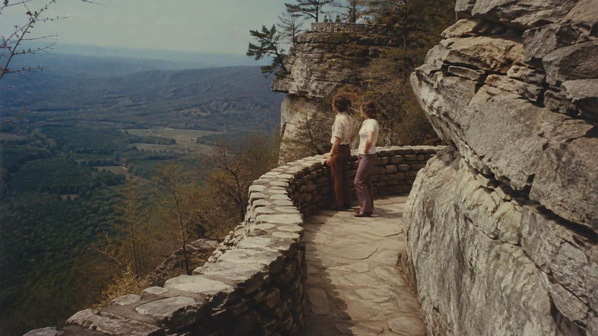 12 Road Trip Destinations from the '70s Boomers Loved 3 Authentic 1970s photo of tourists at Rock City