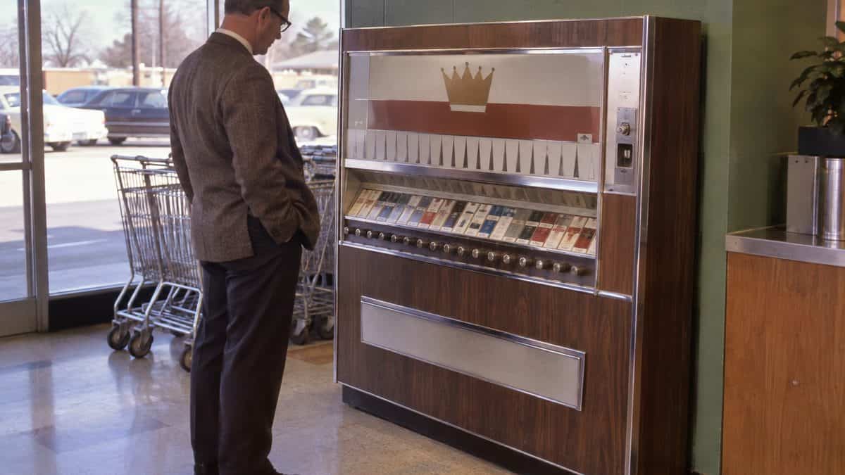 15 Grocery Store Features from the '60s That Have Vanished 12 1960s cigarette vending machine.