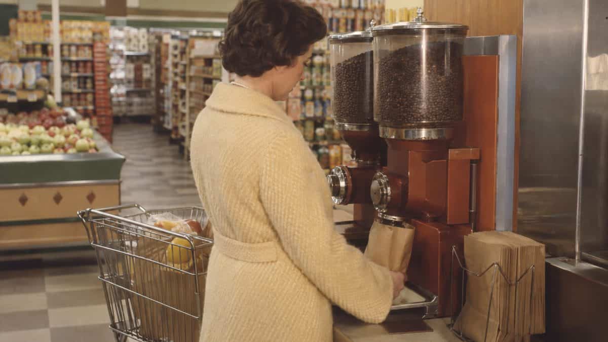 15 Grocery Store Features from the '60s That Have Vanished 6 Authentic 1960s photo of a customer using an in-store coffee grinder