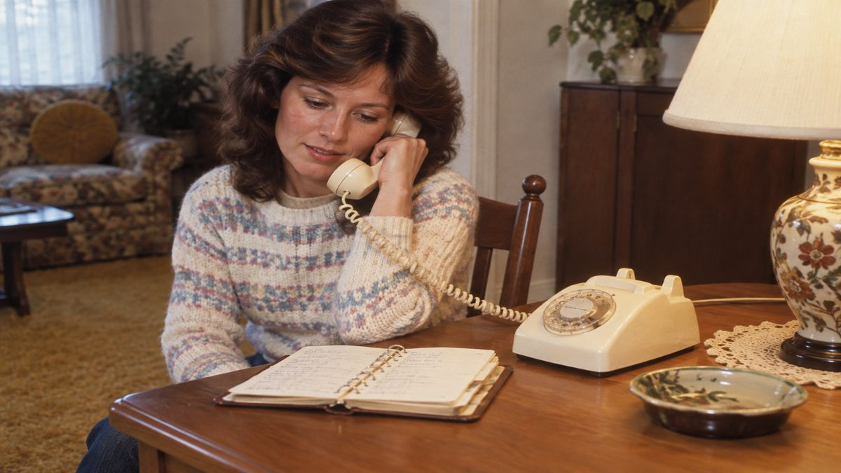 Life Skills Our Generation Mastered That Barely Exist Anymore 16 Vintage rotary phone with a handwritten paper address book