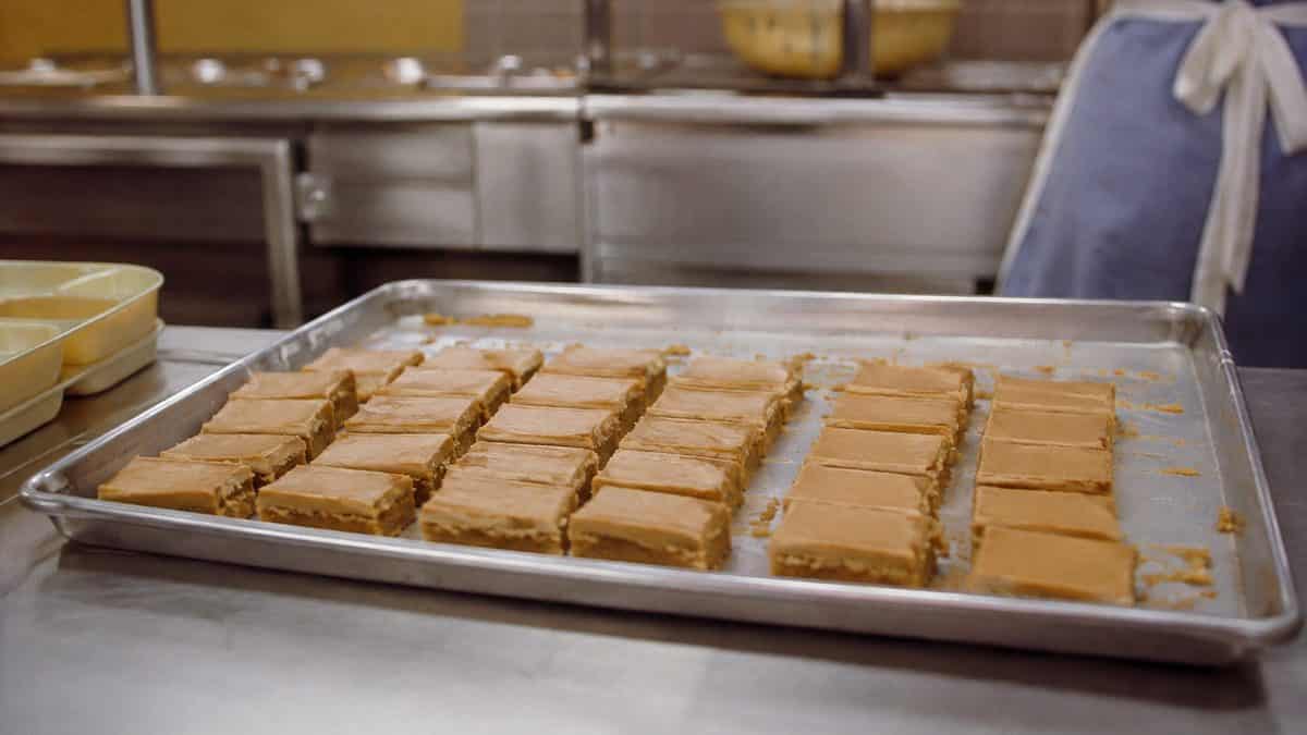 School Cafeteria Food from the '70s We Secretly Loved 12 Peanut butter bars on a baking sheet or lunch tray