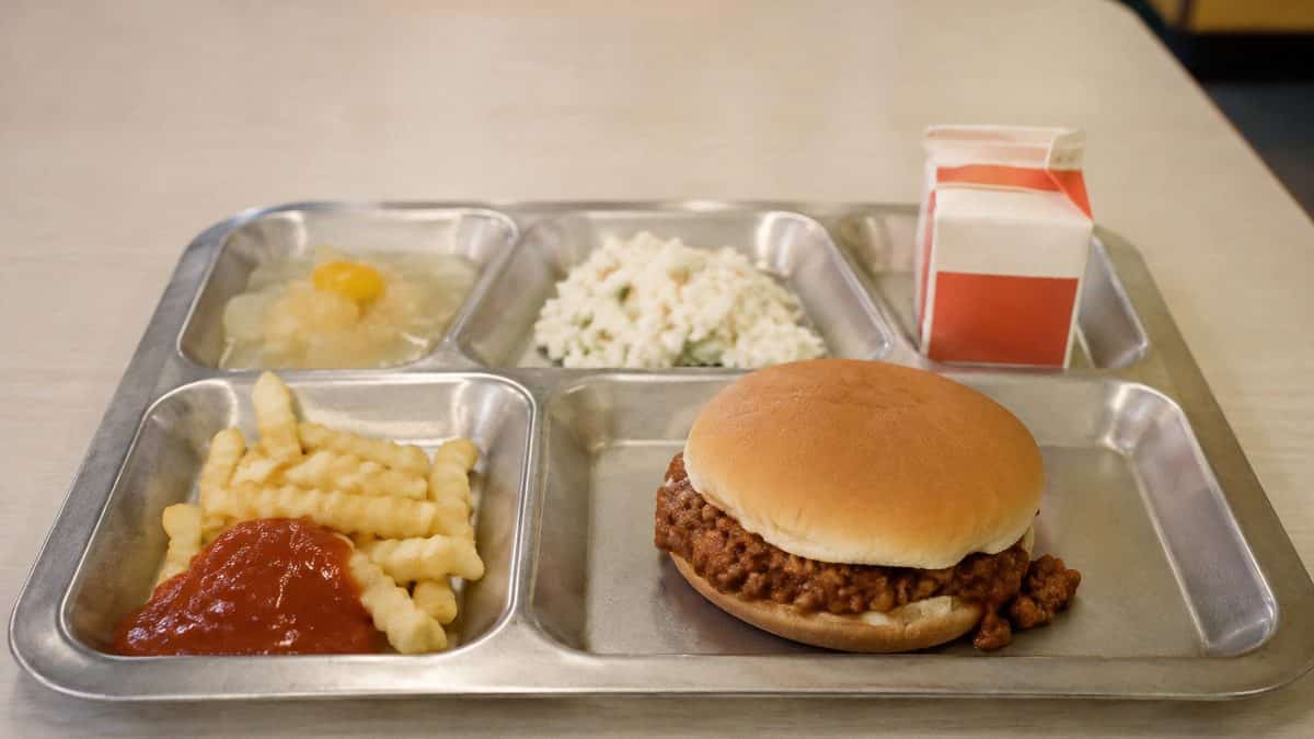 School Cafeteria Food from the '70s We Secretly Loved 5 Natural photo of a 1970s school lunch tray with a Sloppy Joe.