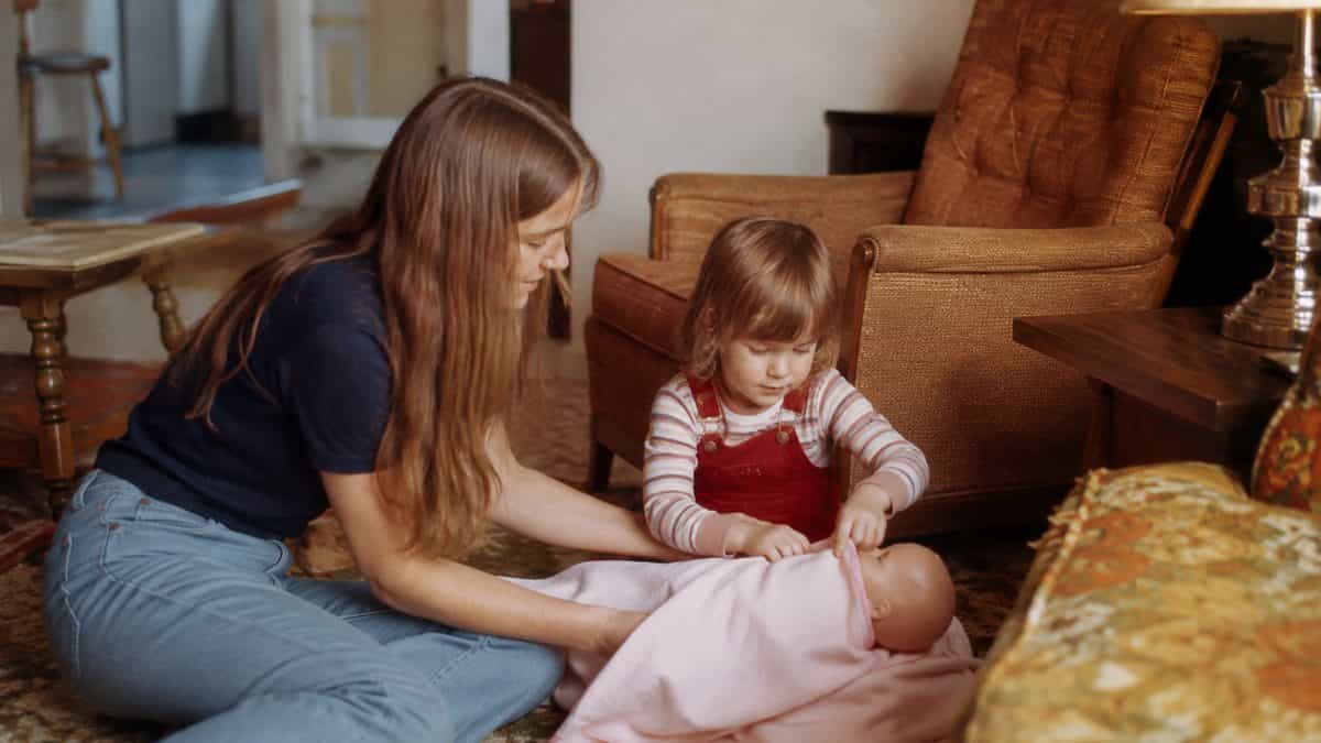 12 Basic Life Skills We Learned in Home Economics That Kids Don't Learn Today 11 Children playing with dolls or babysitting