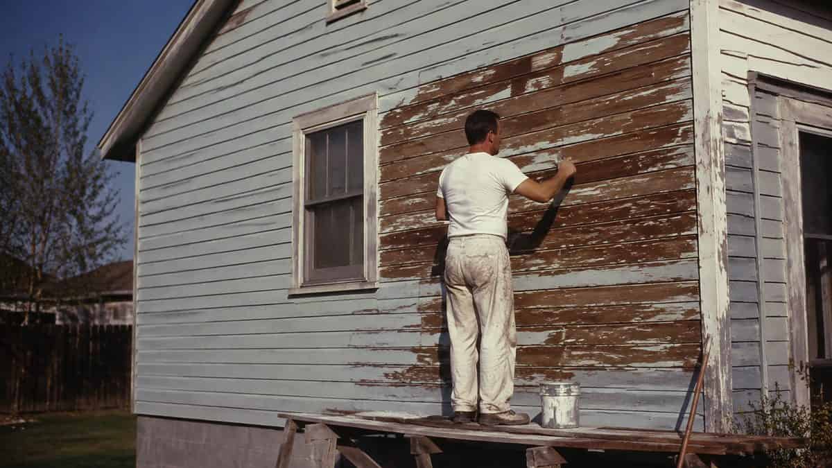 Parenting Practices from the '60s That Were Completely Normal Then 4 Real vintage photo of someone painting or renovating a house