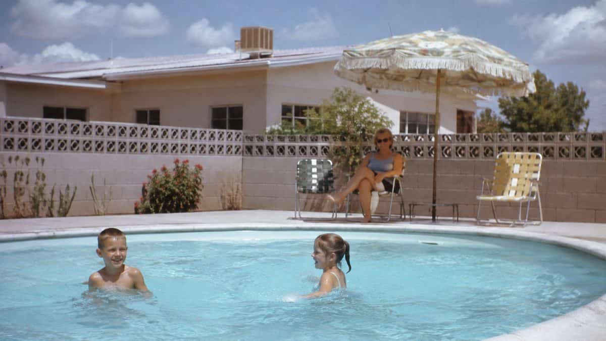 Parenting Practices from the '60s That Were Completely Normal Then 5 Real vintage photo of kids playing in a swimming pool