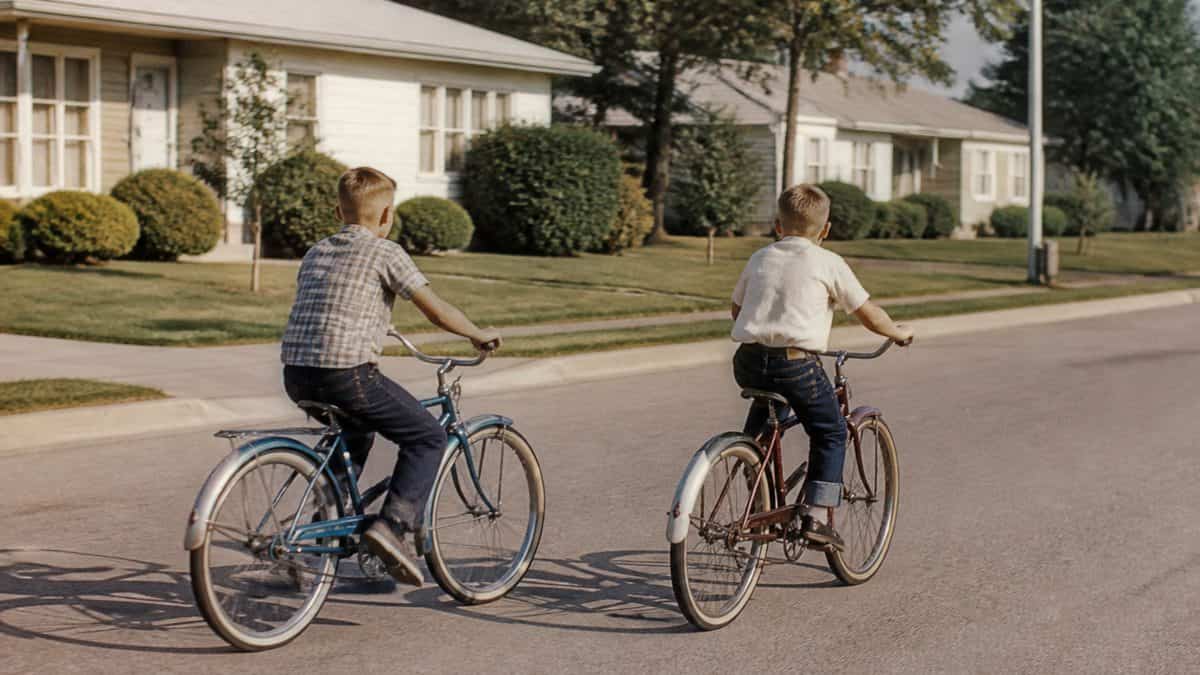 Parenting Practices from the '60s That Were Completely Normal Then 8 Children riding bicycles without helmets