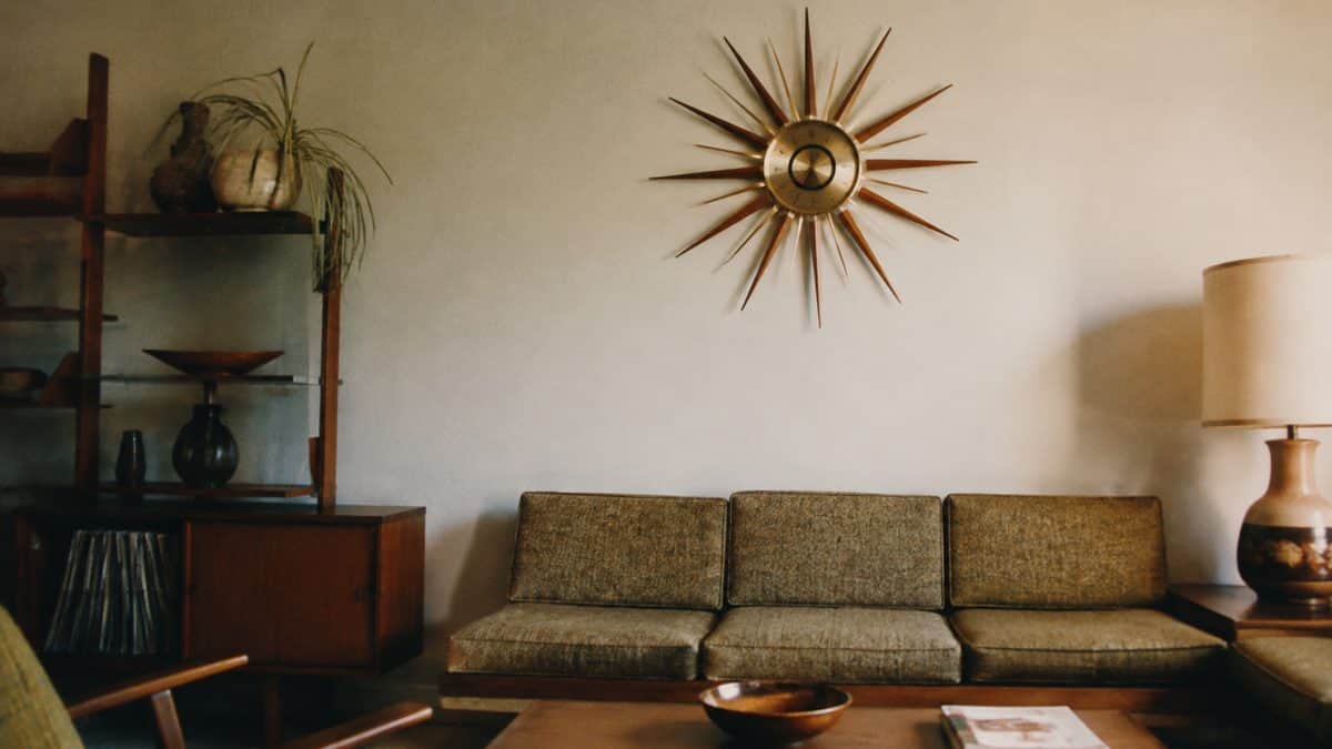 Retro Home Decorations That Are Surprisingly Valuable Now 2 Mid-century sunburst clock in a 1960s living room