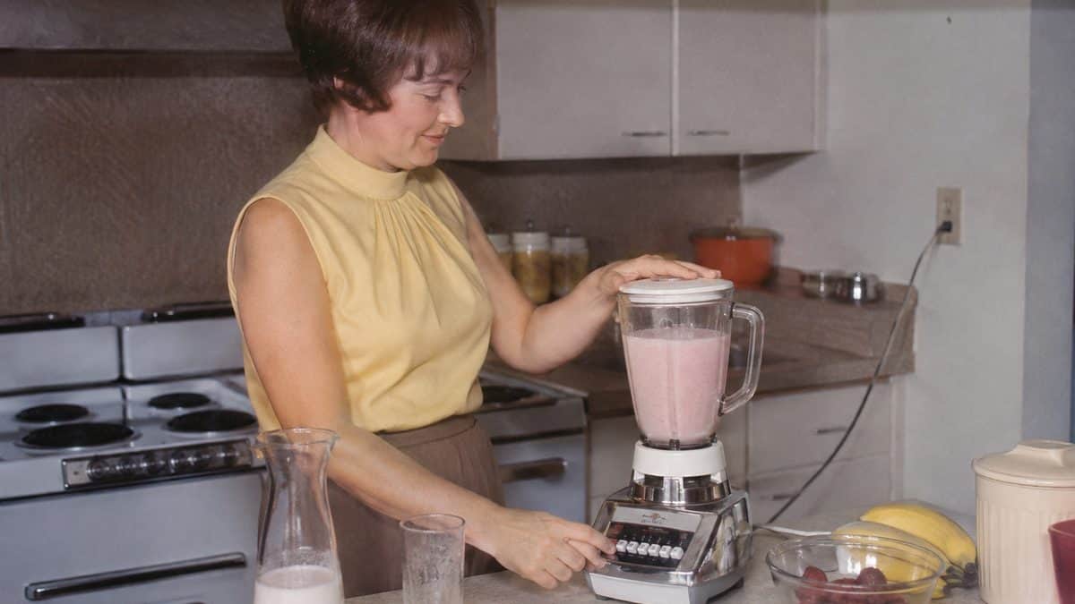 14 Vintage Kitchen Appliances from the '60s Worth a Small Fortune Today 6 Genuine photograph of a vintage Oster Imperial VIII Blender in use.