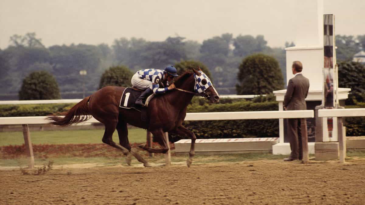 Defining Sports Moments from the '70s That Made Headlines 6 Secretariat winning the Belmont Stakes in 1973