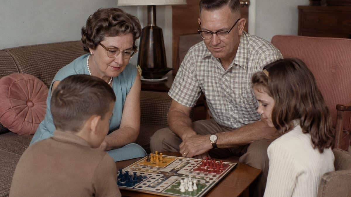 Classic Board Games from the '60s Worth Playing Again 12 Grandparents and kids playing a vintage Aggravation game.