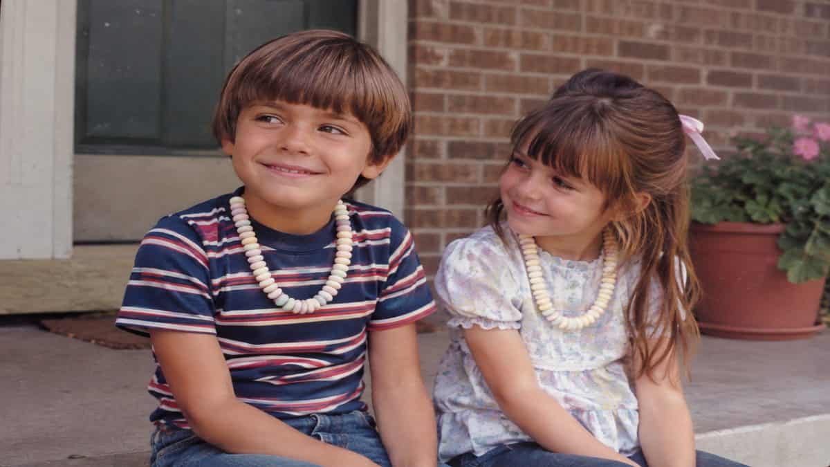Kids with candy necklaces.