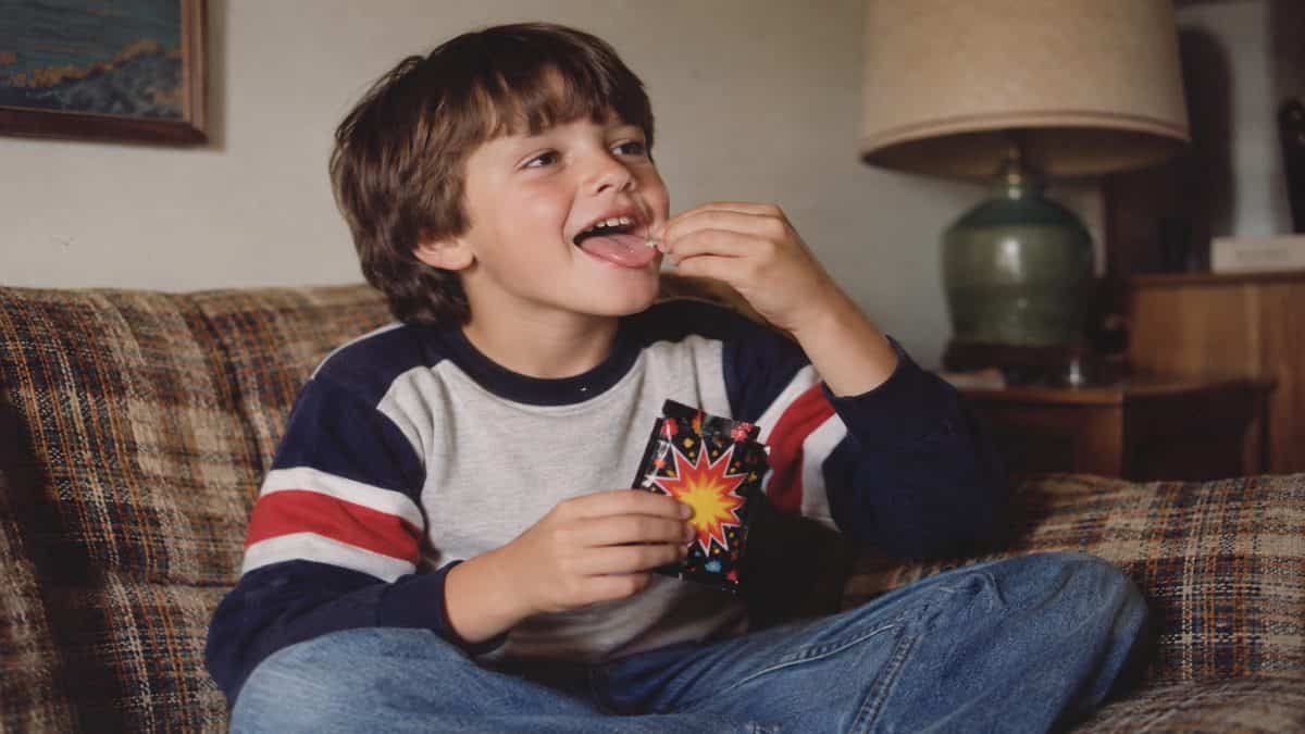 Child eating Pop Rocks.