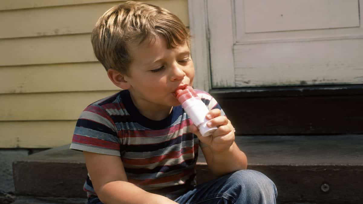 Child eating a push-up pop