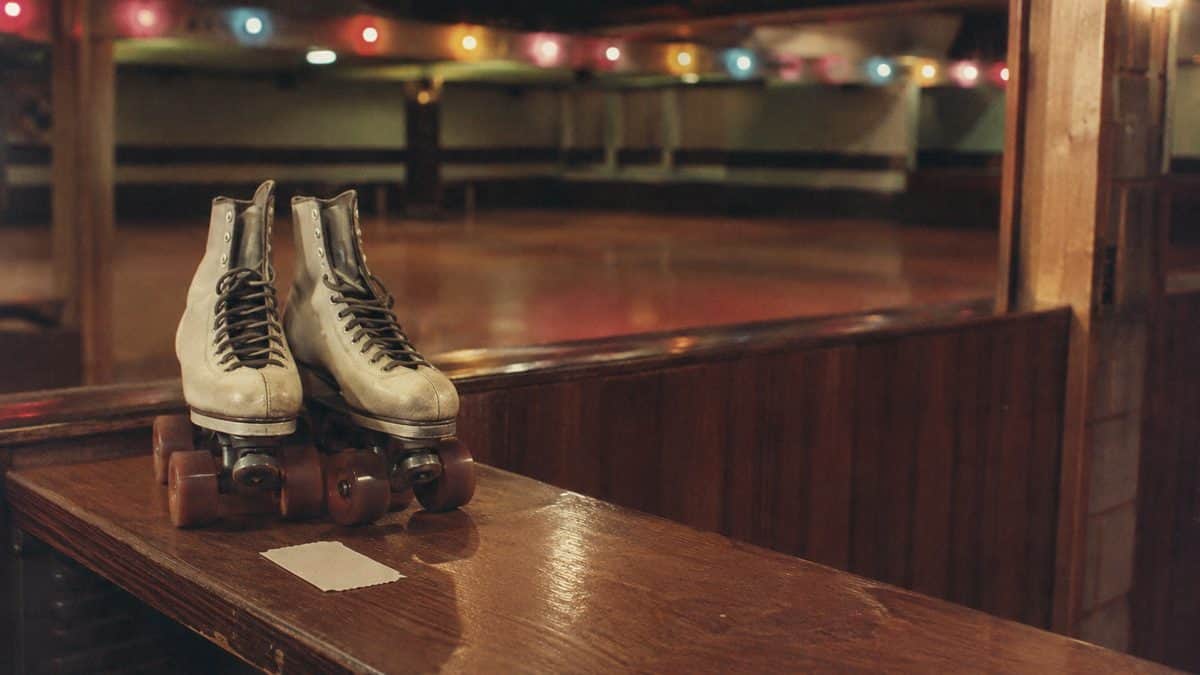 Genuine 1970s photograph of kids at a roller rink