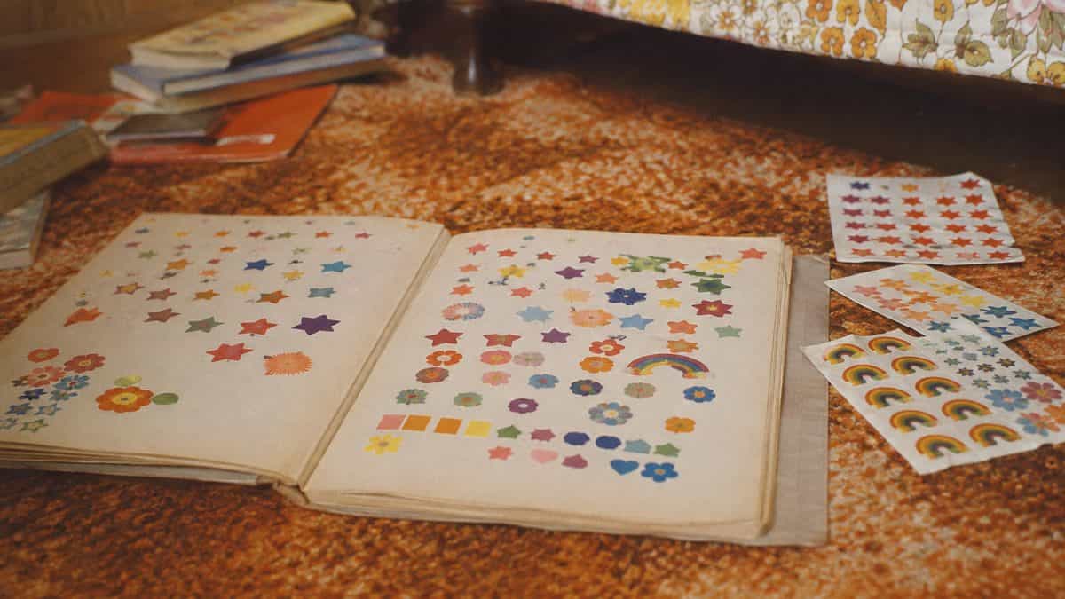Children with sticker albums