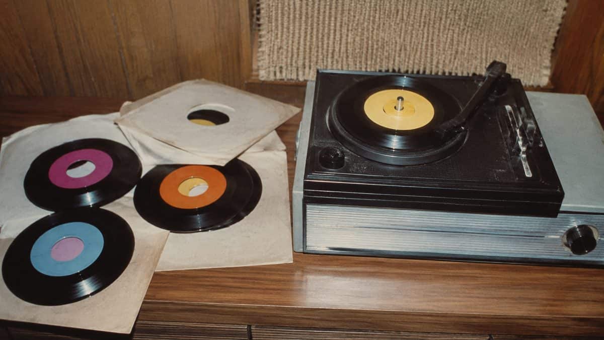 Person browsing real vinyl records.