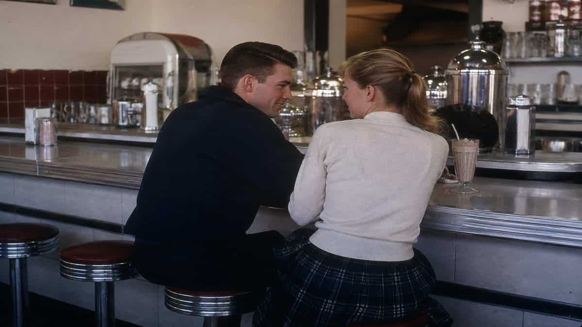 Couple at a 1950s soda fountain.