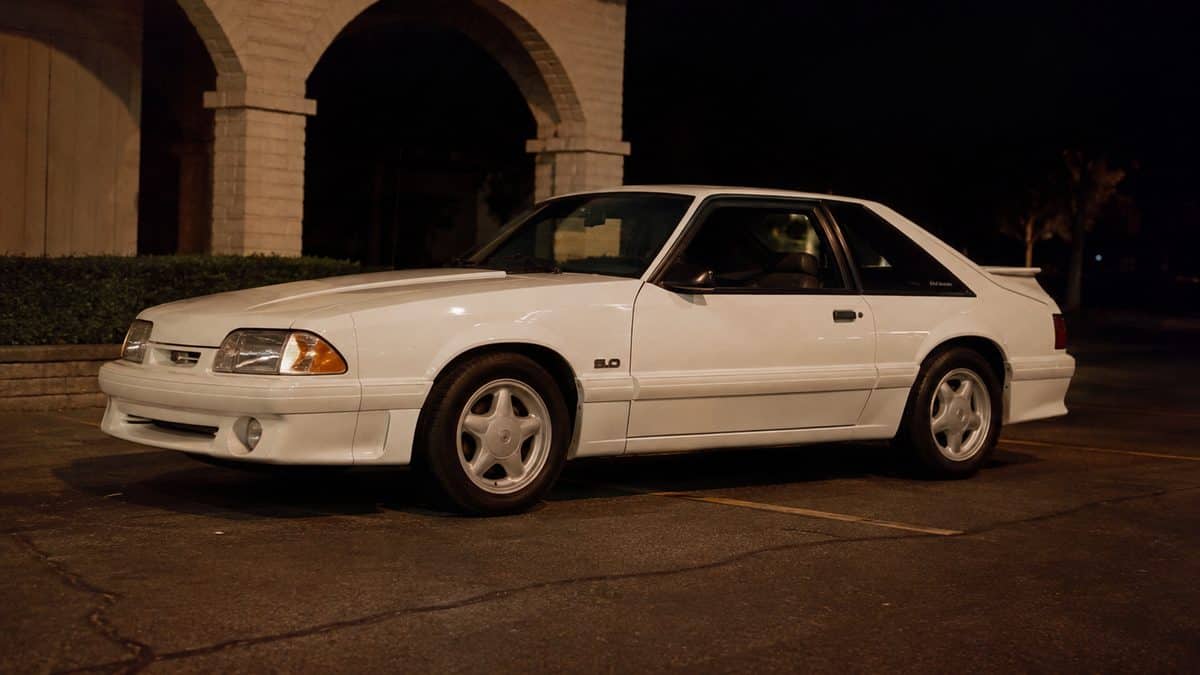 Authentic night photo of a 1987 Ford Mustang GT.