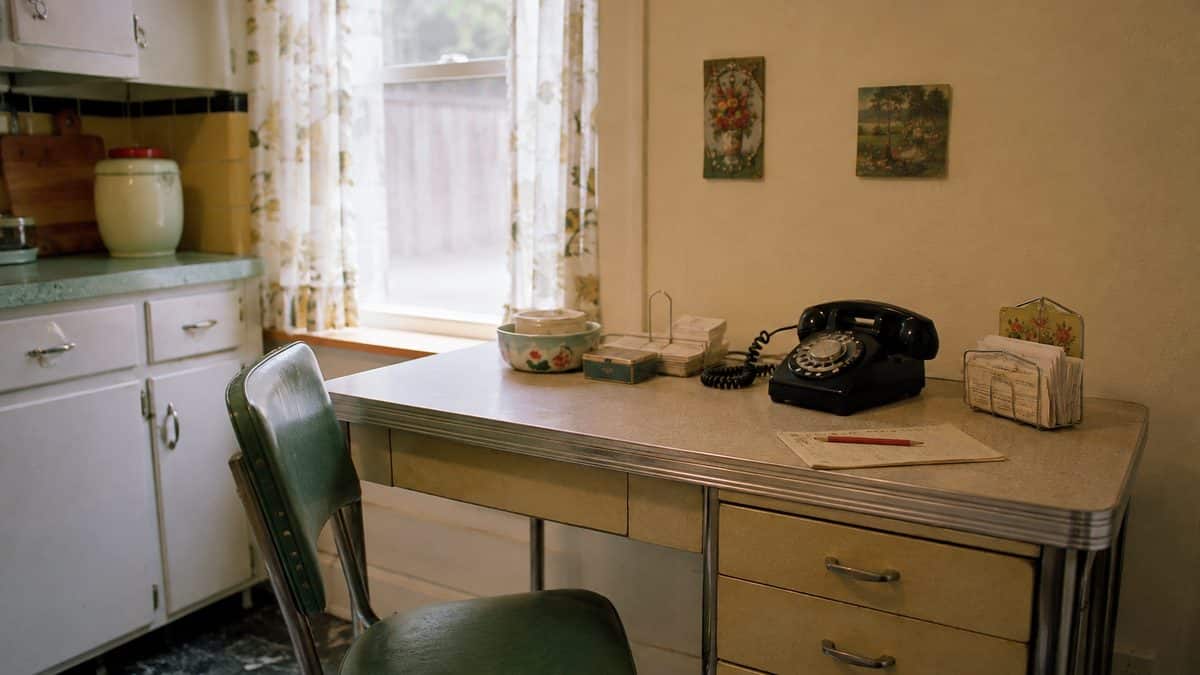 How '50s Moms Kept the Family Organized Without Any Tech 2 1950s kitchen desk with a real rotary phone