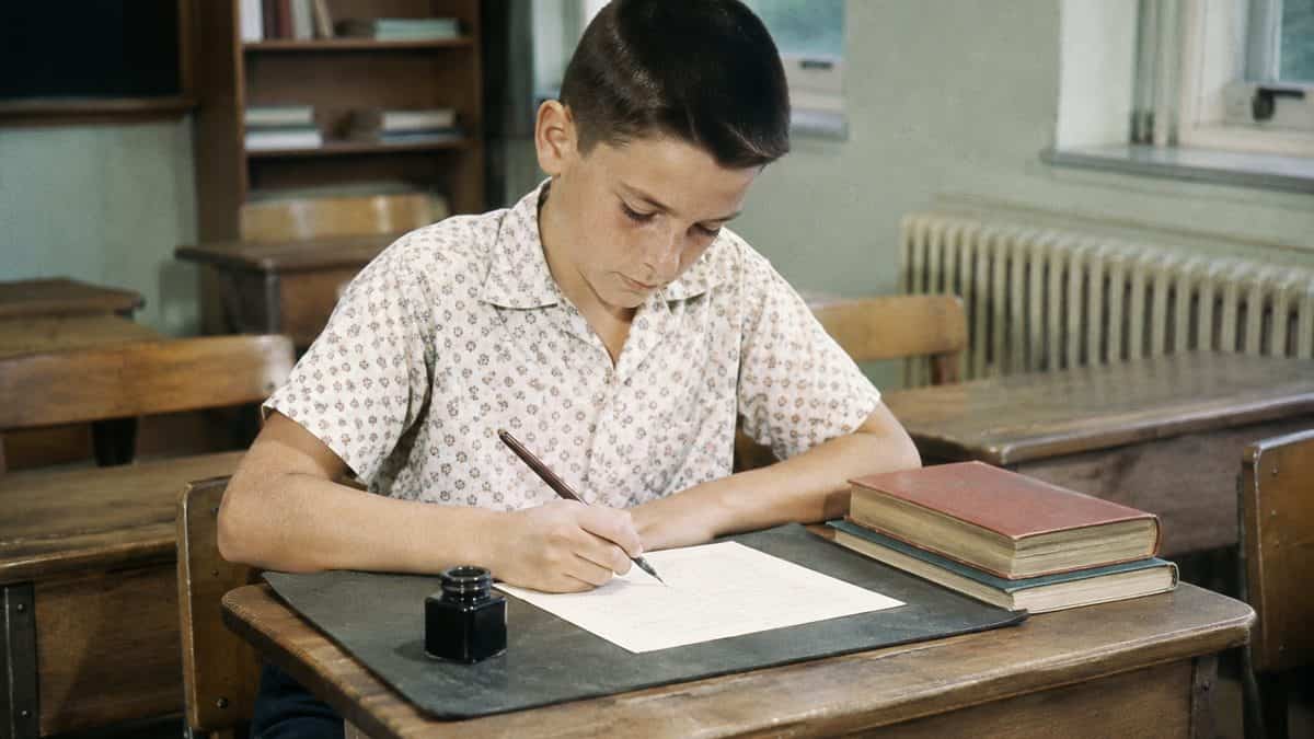 Remember These? 14 School Supplies That Defined the '50s Classroom 8 Student using a flat paper ink blotter
