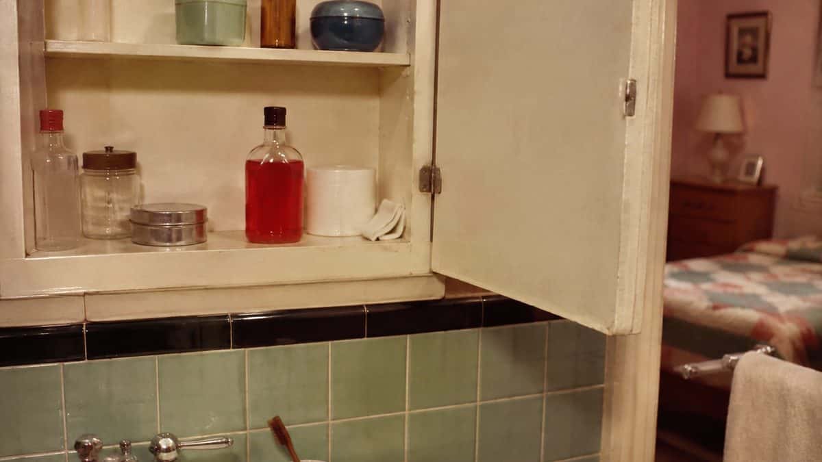 Home Remedies from the '50s Your Grandma Swore By 6 1950s medicine cabinet or real Mercurochrome bottle