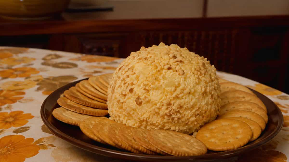 13 Party Foods from the Seventies That Should Make a Comeback 3 Vintage cheese ball with crackers