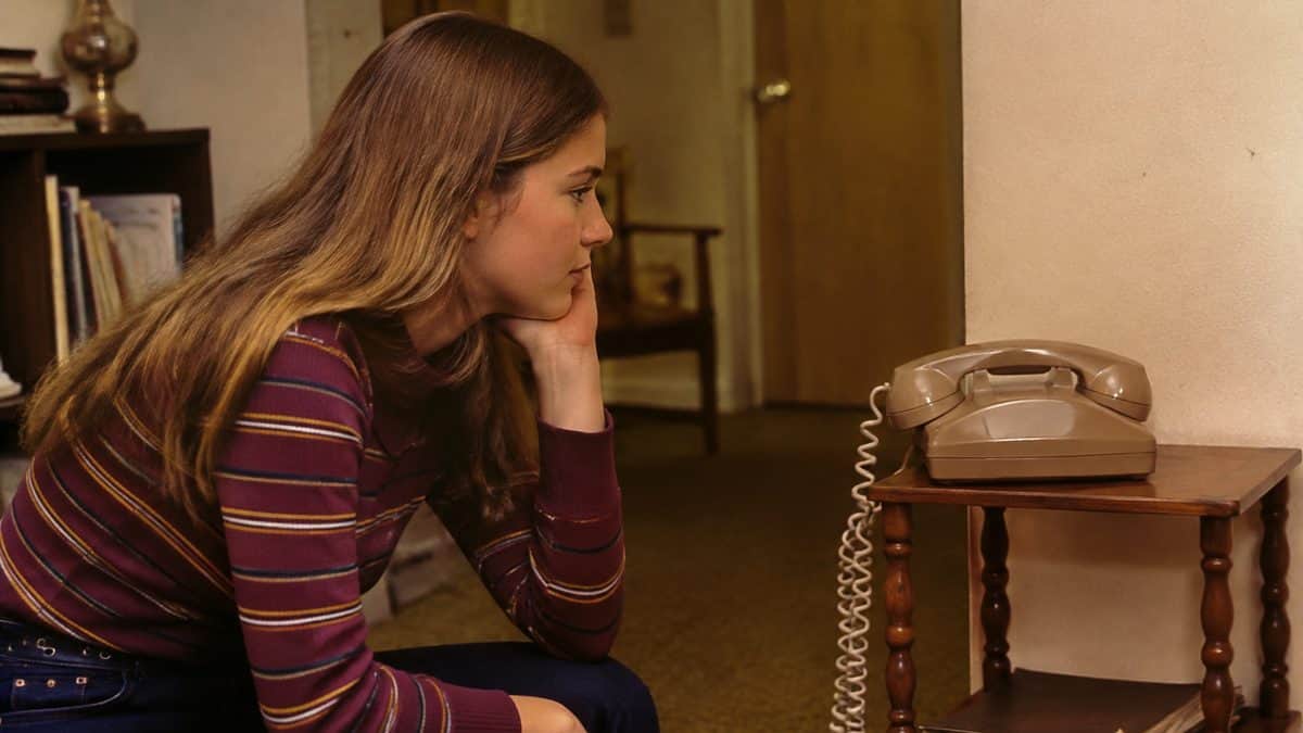 Dating Rules from the '70s That Sound Completely Insane Now 2 Authentic 1970s photo of a teenager waiting by a telephone.