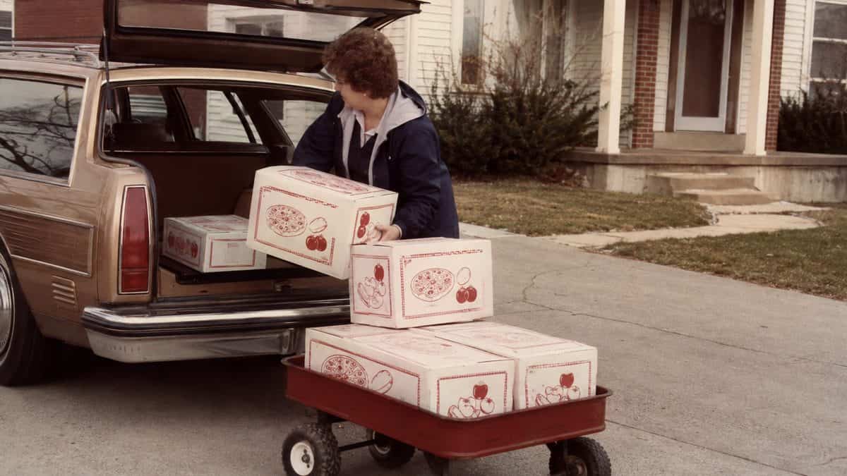 School Fundraisers from the Sixties Through the Nineties 12 Parents distributing fundraising food kits